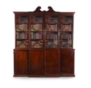 A GEORGE III MAHOGANY BREAKFRONT LIBRARY BOOKCASE, CIRCA 1800