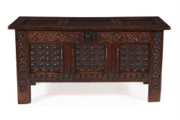 A CHARLES I CARVED OAK COFFER, SECOND QUARTER 17TH CENTURY
