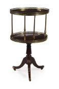 A GEORGE IV MAHOGANY TWO TIER DUMB WAITER, IN THE MANNER OF GILLOWS, CIRCA 1825