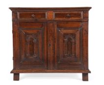 A CHARLES II OAK, FRUITWOOD AND SNAKEWOOD ENCLOSED CHEST OF DRAWERS, CIRCA 1670