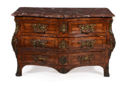 Y A REGENCE GILT METAL MOUNTED KINGWOOD BOMBE COMMODE, CIRCA 1720