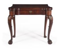 A GEORGE II MAHOGANY FOLDING CARD TABLE, POSSIBLY IRISH, CIRCA 1750
