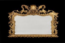 AN IRISH GEORGE II GILTWOOD AND GESSO WALL MIRROR, CIRCA 1750