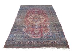 A LARGE TABRIZ CARPET, approximately 745 x 390cm