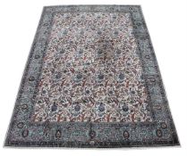 A TABRIZ CARPET, signed by master weaver Javan Amir Khiz, approximately 461 x 322cm