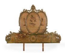 AN ITALIAN CARVED GILTWOOD, GESSO AND PAINTED BEDHEAD, LATE 18TH/EARLY 19TH CENTURY