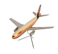 An aircraft manufacturers desk top model of an Airbus A300 passenger plane
