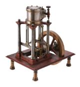 A well engineered period model of a vertical live steam colliery type engine