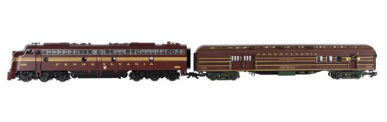 An Aristocraft G gauge 1/29th scale model of a Pennsylvania American EMD E8 diesel Locomotive