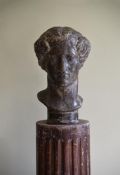 AFTER THE ANTIQUE, AN ITALIAN SCAGLIOLA HEAD OF THE GODDESS ARIADNE
