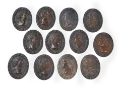 A SET OF TWELVE ITALIAN BRONZE OVAL PLAQUES OF ROMAN EMPERORS, LATE 18TH/EARLY 19TH CENTURY