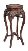 A Chinese carved hardwood and marble inset jardinière stand