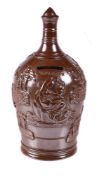 An English brown salt-glazed stoneware bottle-shaped commemorative money box