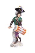 A modern Meissen monkey band drummer