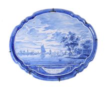 A Dutch Delft blue and white horizontal wall-plaque