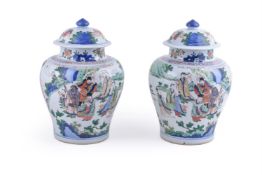 A pair of Wucai vases and covers