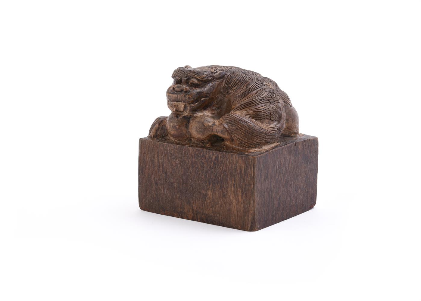 A Chinese wood 'Buddhist' lion seal