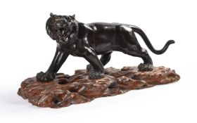 A Japanese Cast Bronze Model of a Prowling Siberian Tiger