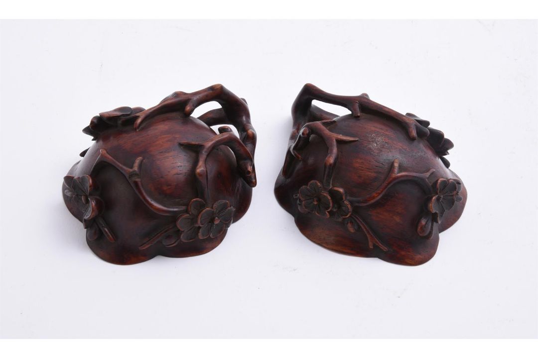 A pair of Chinese Huanghuali 'prunus and lotus' cups - Image 4 of 4