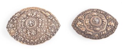 Two Chinese Straits silver-gilt repoussé buckles