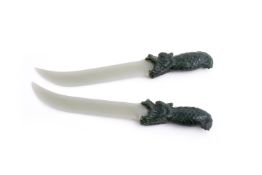 A pair of jadeite models of daggers