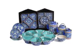 Three Chinese blue and turquoise enamelled 'Shou' teapots and covers