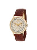 Y GUBELIN, A GOLD COLOURED CALENDAR CHRONOGRAPH WRIST WATCH