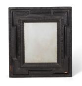 Y A CONTINENTAL EBONISED WALNUT WALL MIRRORPROBABLY FLEMISH