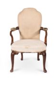A GEORGE II WALNUT OPEN ARMCHAIR, CIRCA 1730