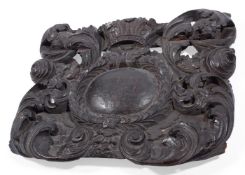 A CHARLES II CARVED OAK WALL MOUNT, CIRCA 1665