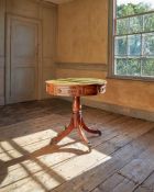 A REGENCY MAHOGANY DRUM LIBRARY TABLE, IN THE MANNER JOHN MCLEAN, CIRCA 1820
