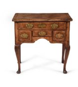 A GEORGE I WALNUT AND CROSSBANDED SIDE TABLE, CIRCA 1725