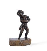 A BRONZE GROUP OF A CHILD WITH HIS PUPPY, POSSIBLY FRENCH, 17TH/18TH CENTURY