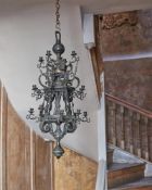 A FLEMISH BRONZE TWENTY-LIGHT CHANDELIER, 17TH CENTURY AND LATER