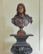 AN ITALIAN CARVED WALNUT PORTRAIT BUST OF A GENTLEMAN, 17TH CENTURY