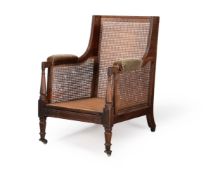 AN UNUSUAL GEORGE IV MAHOGANY HIGH BACK LIBRARY BERGERE ARMCHAIR, CIRCA 1815