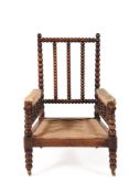 Y A VICTORIAN ROSEWOOD BOBBIN FRAMED ARMCHAIR, POSSIBLY AMERICAN, LATE 19TH CENTURY