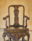 A GEORGE II BLACK LACQUER AND GILT JAPANNED ARMCHAIR, CIRCA 1730