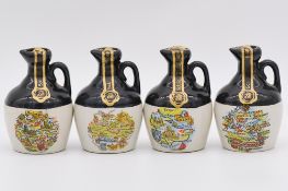 Twenty four assorted Rutherford's ceramic decanters, maps and flags