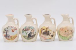 Sixteen assorted Rutherford's ceramic decanters, Cat series