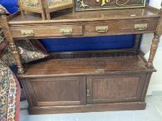 Early 20th cent. Oak buffet with carved floral decoration and brass furniture. 54ins. x 51ins. x