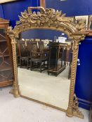19th cent. Gilt and Gesso over mantle heavily decorated with acanthus leaves above the arched top.