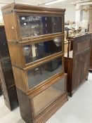Early 20th cent. Oak Globe-Wernicke glazed waterfall sectional bookcase with four opening