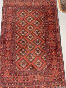 Carpets & Rugs: 20th cent. Turkman woolen carpet, red ground, six borders, geometric stylised