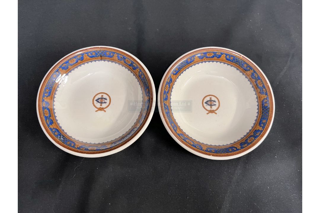 INTERNATIONAL MERCANTILE MARINE: American polychrome buffalo china ceramic dishes, a pair. 5ins. NB.