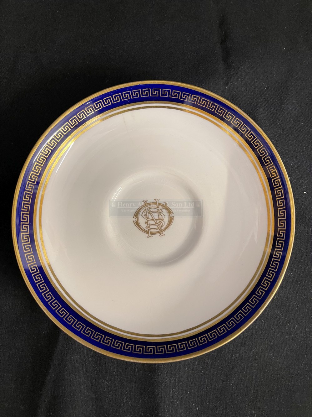 WHITE STAR LINE: Rare First-Class Spode cobalt blue and Gilt Greek key decorated saucer, crack to