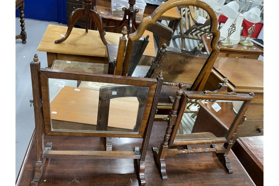 19th cent. Mahogany dressing table mirrors of delicate form (3).