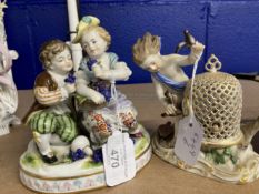 19th/20th cent. Ceramics: Naples Porcelain, figure of boy and girl seated, holding bunches of