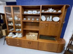 20th cent. 1970s G plan teak furniture. Suite of four wall units to include glazed bookcase over
