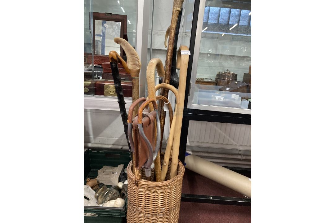 Walking Sticks: 20th cent. Wicker basket cane/umbrella stand with a selection of eight canes - Image 1 of 3